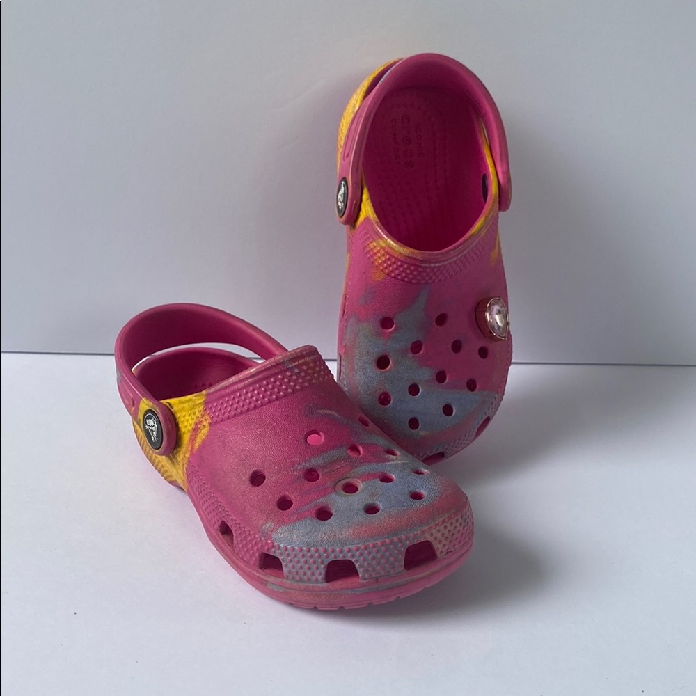 CROCS Pink and Yellow Water Shoes with Perforated Design.